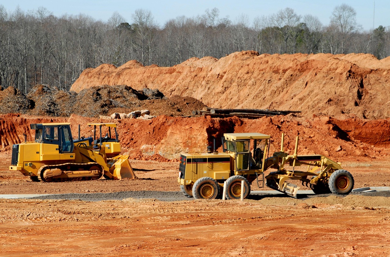 construction site, heavy equipment, dirt mover, construction, equipment, industrial, machinery, machine, work, industry, nature, building, vehicle, excavator, bulldozer, yellow, earth, hydraulic, metal, ground, shovel, dig, build, sand, dirt, loader, development, road, excavation, construction equipment, site, gravel, bucket, soil, worker, sky, job, engineering, tractor