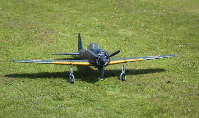 mitsubishi a6m, zero, plane, flight, japan, aviation, nature, flying, aviator, propeller, grass, technology, hobby, propeller machine, low-wing monoplane